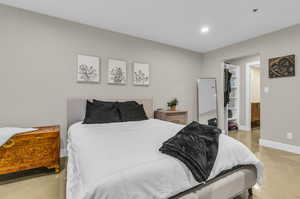 Second bedroom with a Walk through closet leading to the en-suite bathroom.