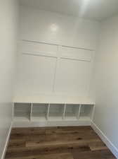 Mudroom with wood-type flooring