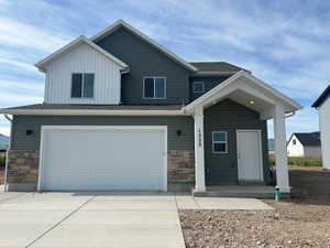 View of front of property with a garage