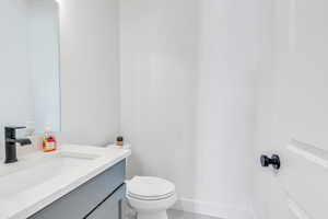 Bathroom featuring toilet and vanity