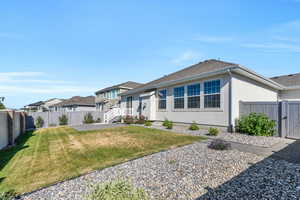 View of front of house with a front yard