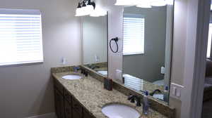 Bathroom featuring dual vanity