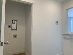 Laundry room featuring hookup for a washing machine and hookup for an electric dryer