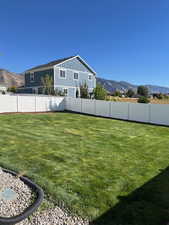 View of yard with a mountain view