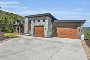 Contemporary house featuring a garage