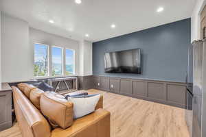 Living room with light wood-type flooring