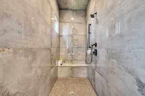 Bathroom with a tile shower