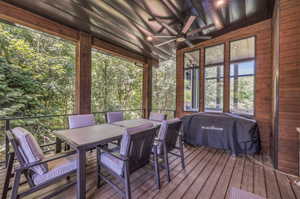 Sunroom / solarium featuring plenty of natural light and ceiling fan