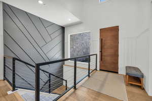 Hallway with light wood-type flooring