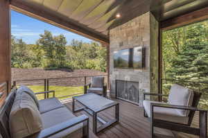 Wooden deck with an outdoor living space