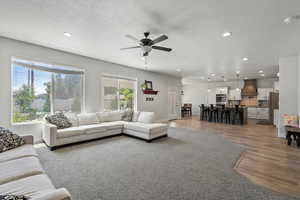 Great Room looking into the kitchen and entrance to covered patio area