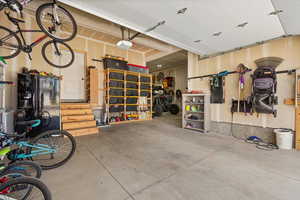 Garage featuring storage loft