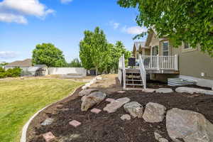 View of yard with a trex deck