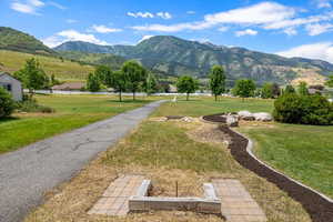 View of mountain view with horseshoe game & walking / biking trail