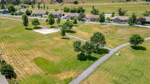 Bird's eye view with a rural view of community area with Playground & Volleyball Court, Picnic Area