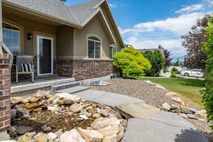 View of front porch & water feature