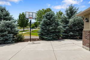 View of sport court featuring a lawn, on RV, Trailer or Boat Parking