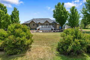 View of yard featuring a deck