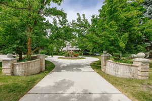 Grand entrance into estate. Circular drive with privacy still afforded to the front door.