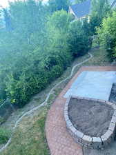 2nd of 3 patios; extension of the backyard, following the panoramic views west to east and facing northeast.