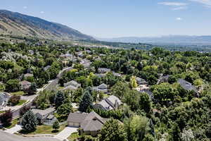 Birds eye view of property with a mountain view