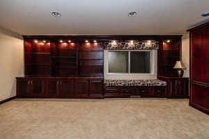 Window bench with matching valance is adorable. Murphy bedroom inclosed in cabinet to the right.