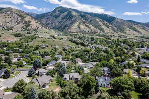 Birds eye view of property with a mountain view