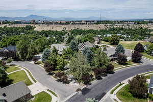 Bird's eye view featuring a mountain view; LOTS OF TREES.