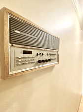 Entire house intercom system.  If texting isn't your things to talk to your household, communicate and play the radio throughout the home.   Located in the butler's pantry off the kitchen.