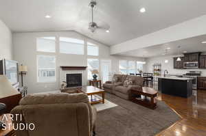 Living room  high vaulted ceiling, ceiling fan, and sink