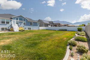 View of yard with a mountain view