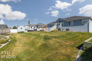 View of yard featuring a garage