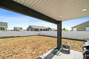 View of yard with a patio area