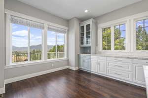 Kitchen table/seating area and backyard deck and views