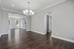 Dining room looking into living/music room. Door leads to pass-thru to kitchen