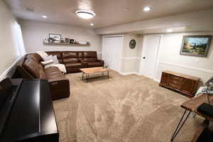 Living room with carpet floors