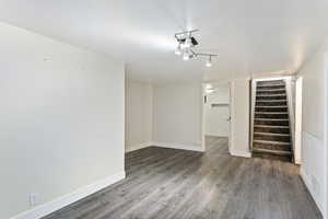 Basement with wood-type flooring