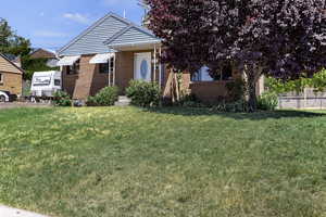 View of front of house with a front lawn