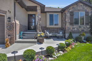 Entrance to property with a patio area