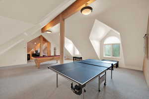 Game room with vaulted ceiling with beams, carpet, and pool table