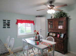 Dining room with ceiling fan