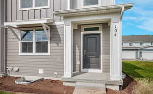 Property entrance with a garage