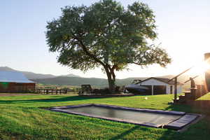 View of yard with a mountain view