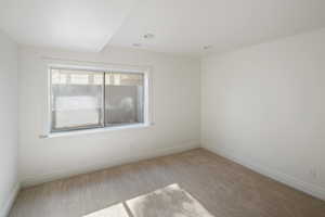 one of 2 basement bedrooms