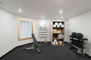 Off the back of the theater room, an exercise area.