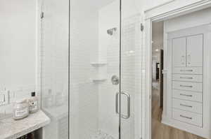 Main level hall bathroom with shower