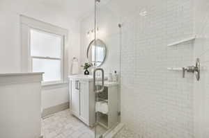 Main level hall bathroom with shower