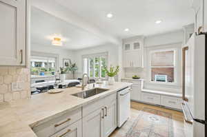 Quartzsite counters and marble backsplash