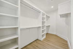 Primary Bedroom walk in closet