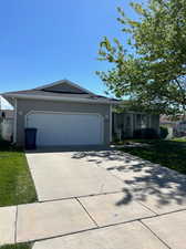 Single story home with a garage